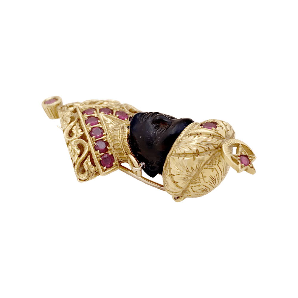 Broche G.NARDI, "Moretto", or jaune, rubis, ébène.