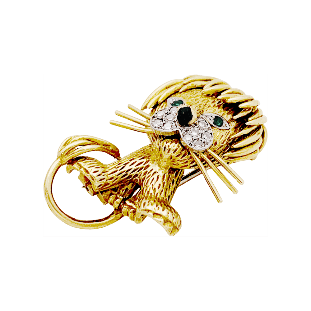 Clip Van Cleef & Arpels, "Lion Ebouriffé", deux ors, diamants, émeraudes, émail.