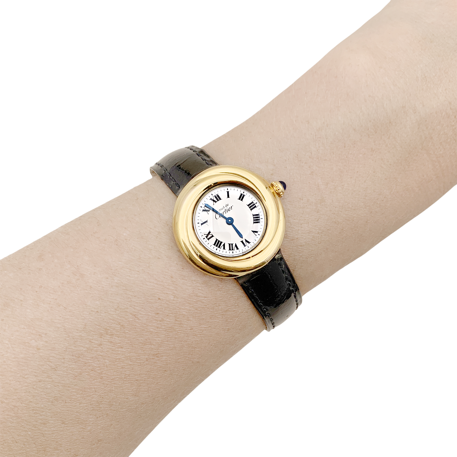 Montre Cartier, "Trinity Must", argent plaqué or, cuir.