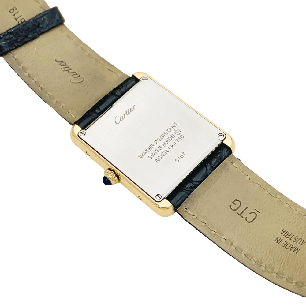 Montre Cartier, "Tank Solo", or jaune et acier.