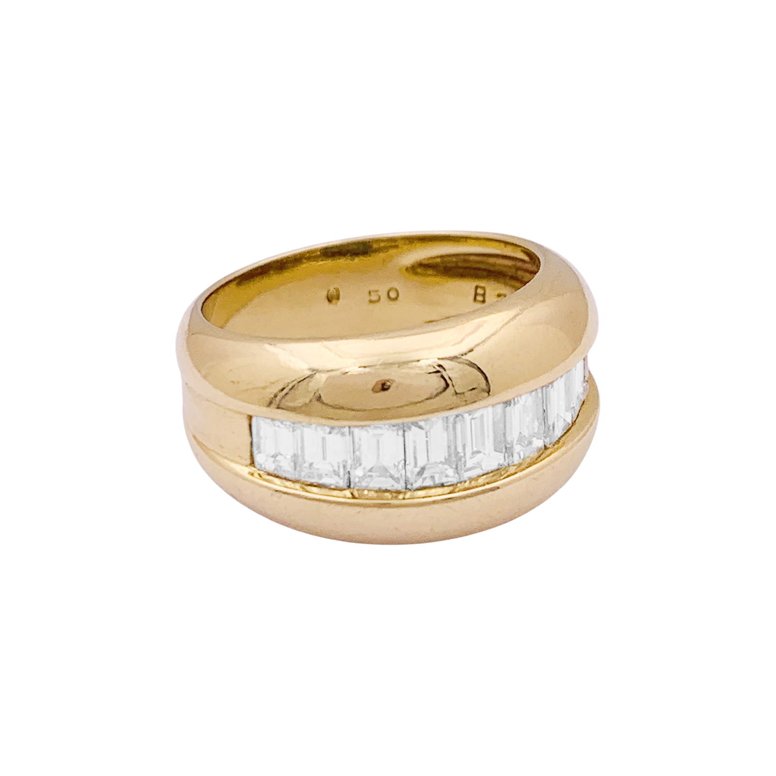 Bague Cartier, "Odin", or jaune, diamants taille émeraudes.