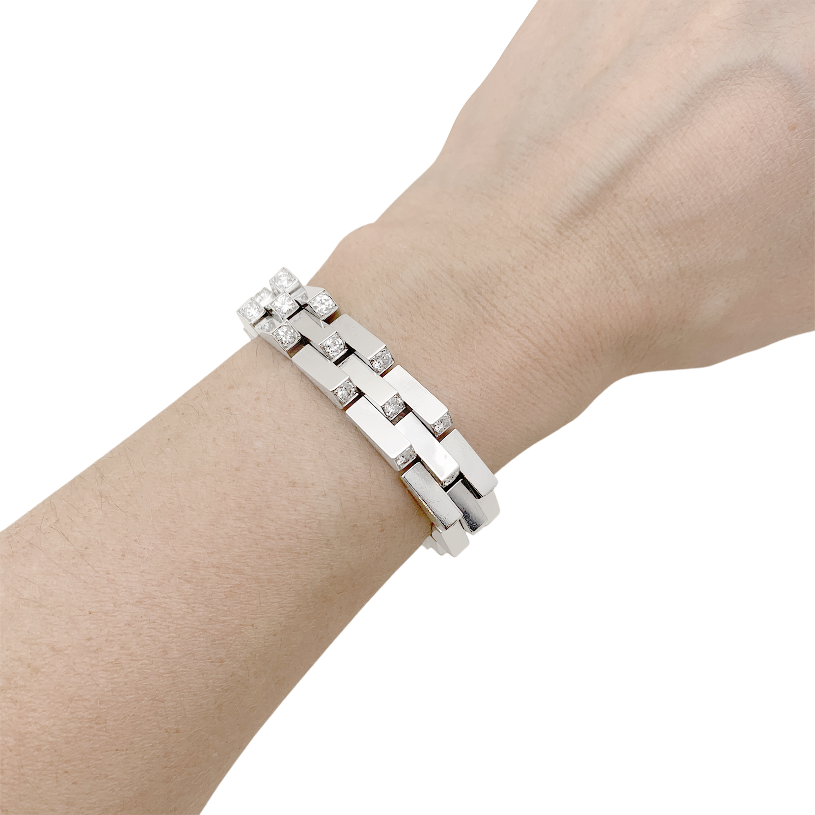 Bracelet Vintage Boucheron, "Crémaillère", platine, diamants.