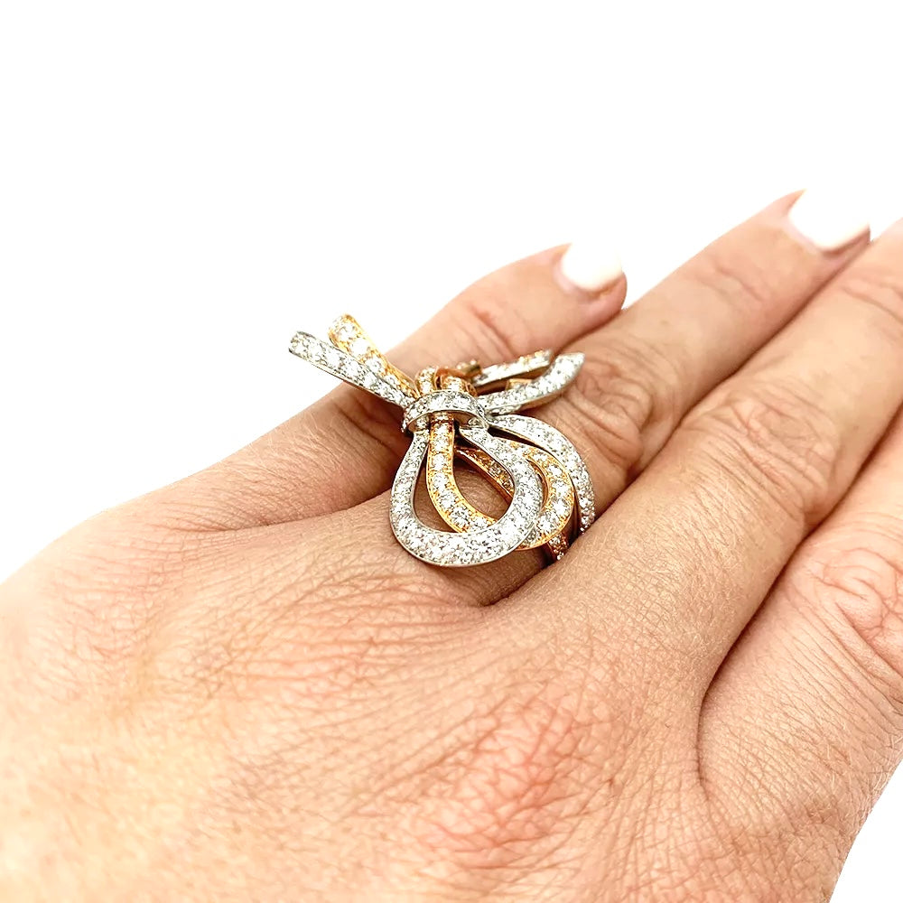 Van Cleef &amp; Arpels ring, "Double Knot", white gold, pink gold, diamonds.