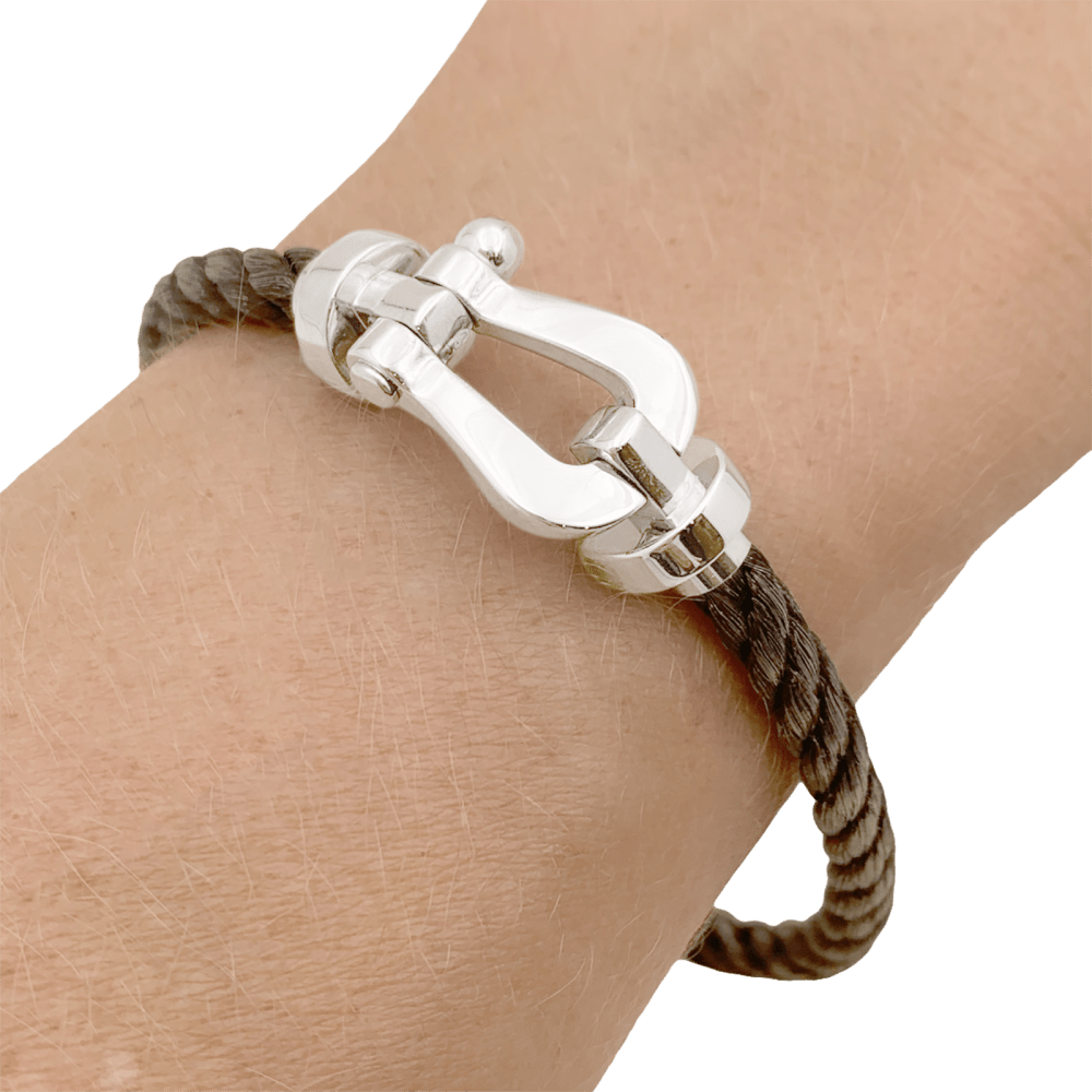 Bracelet Fred, "Force 10", or blanc, corderie.