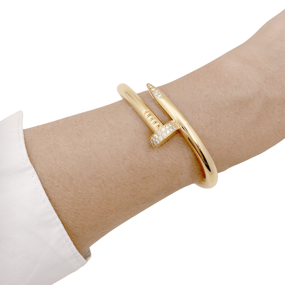 Bracelet Cartier, "Juste un clou", or jaune, diamants.
