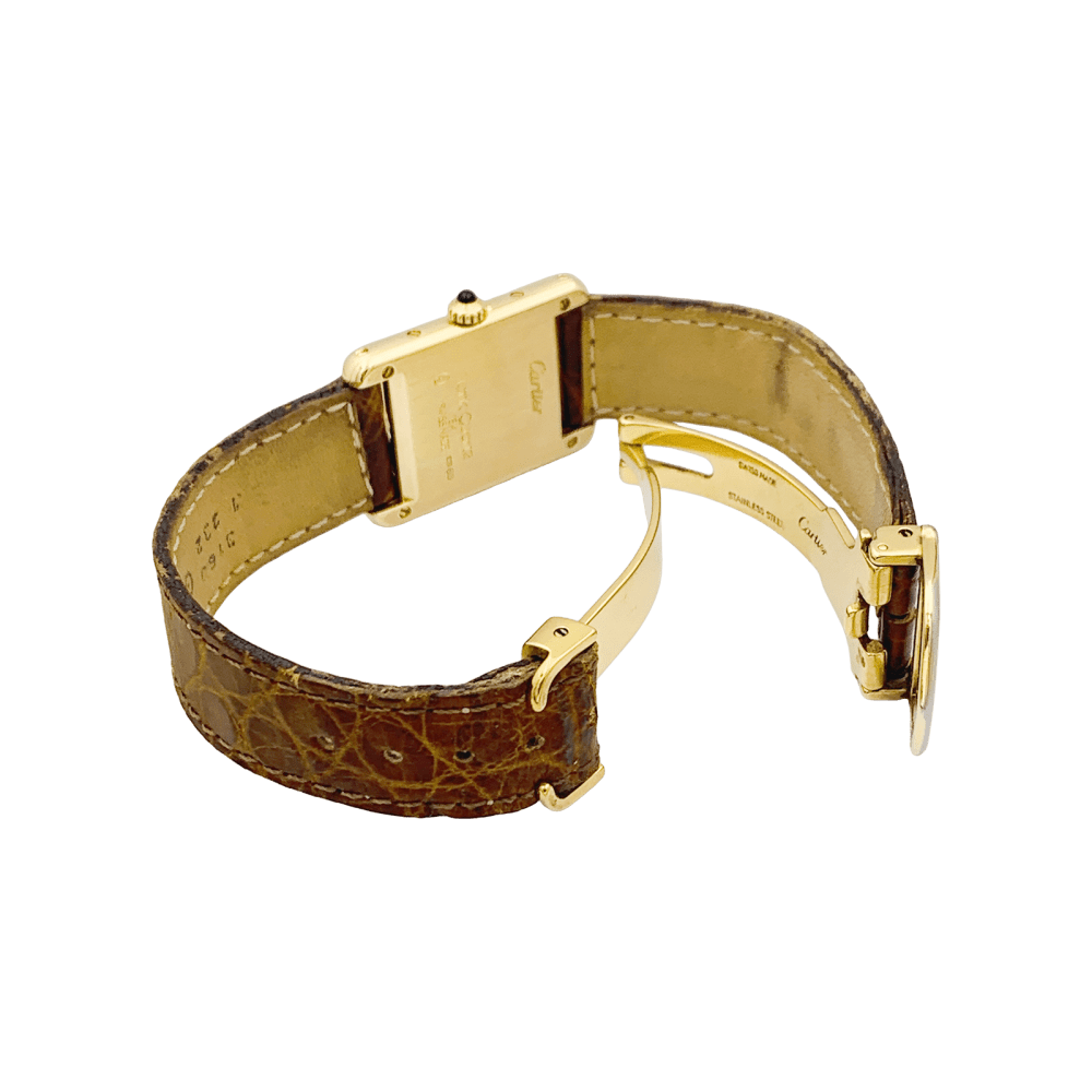 Montre Cartier "Tank Louis Cartier" en or jaune.