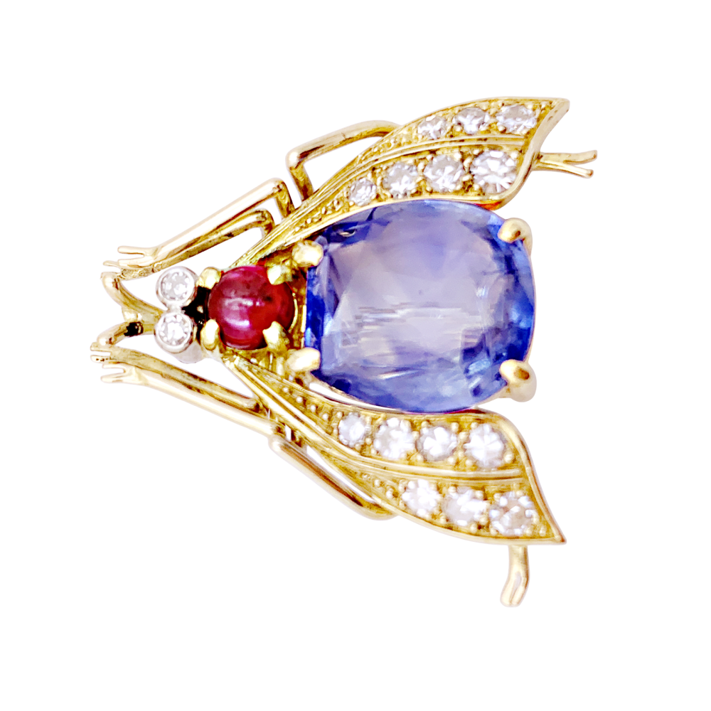 Broche Van Cleef & Arpels, « Abeille », platine, or jaune, saphir, rubis et diamants.