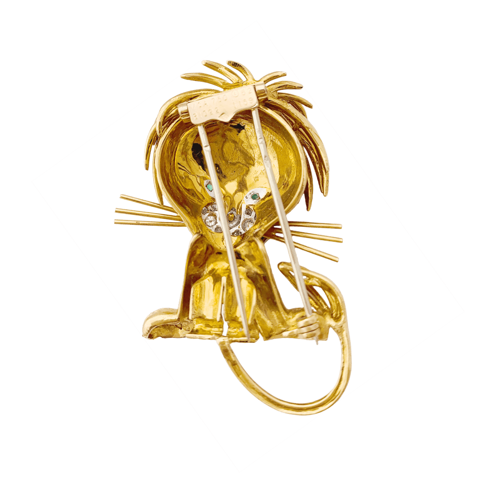 Clip Van Cleef & Arpels, "Lion Ebouriffé", or jaune, émeraude, diamants.