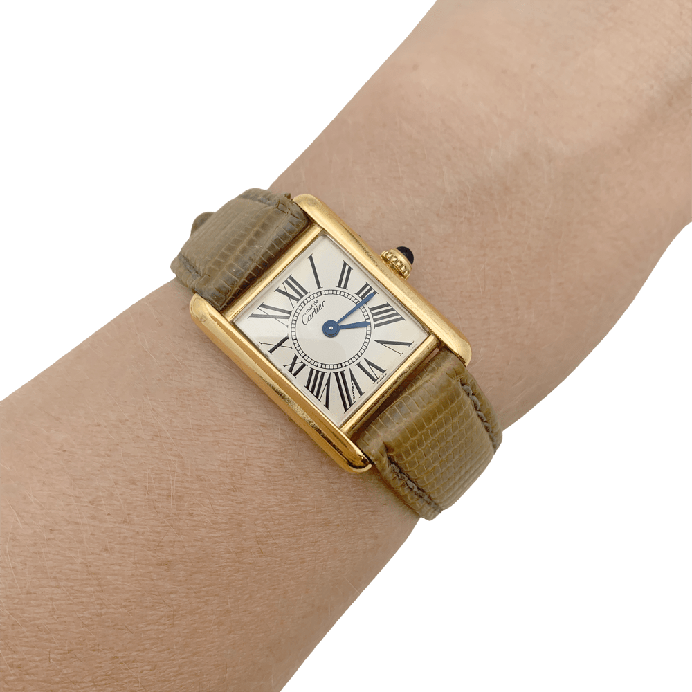 Montre Cartier, "Tank Must" argent plaqué or, cuir.