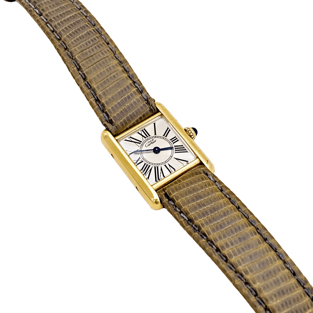 Montre Cartier, "Tank Must" argent plaqué or, cuir.