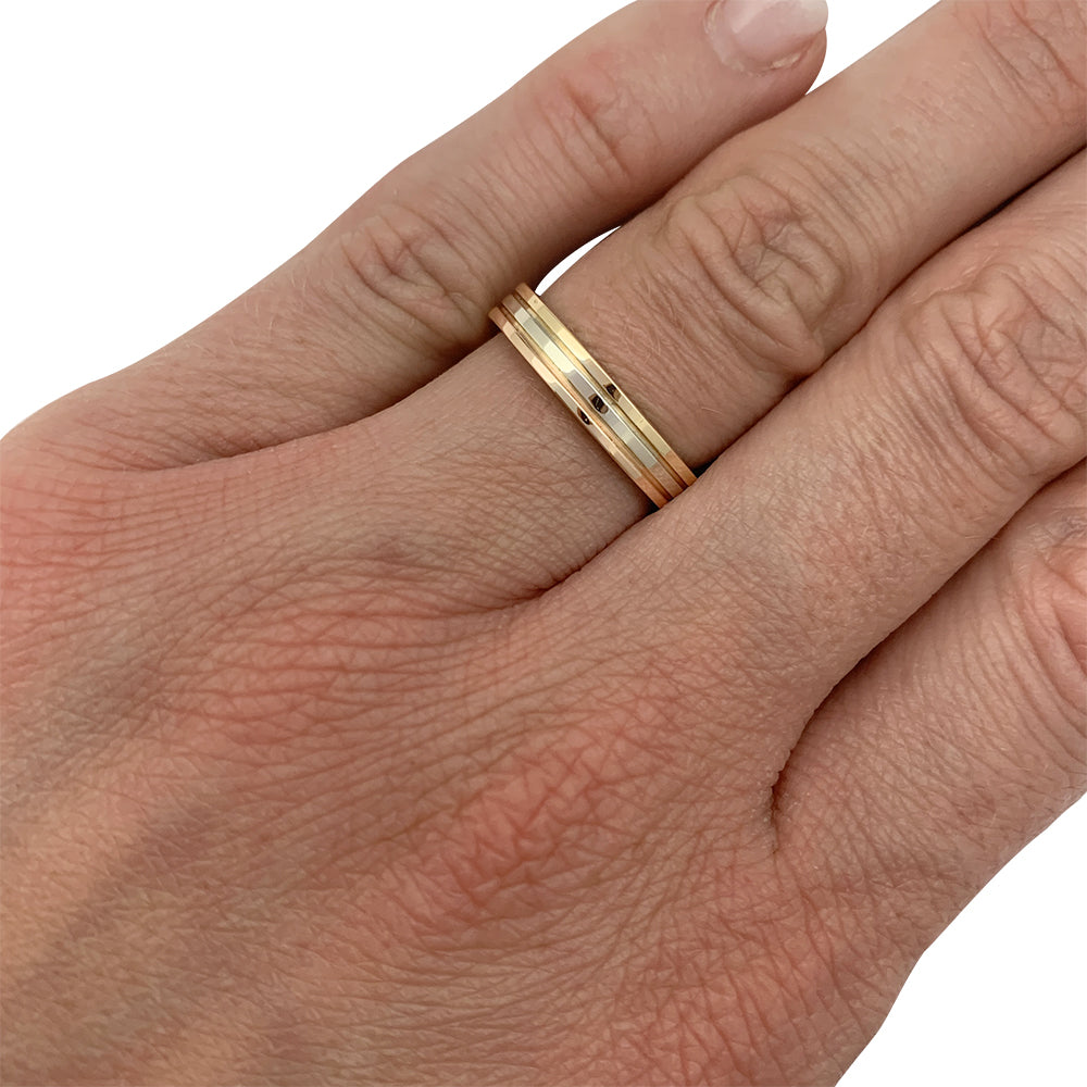 Cartier wedding ring, "Vendôme Louis Cartier", three golds.