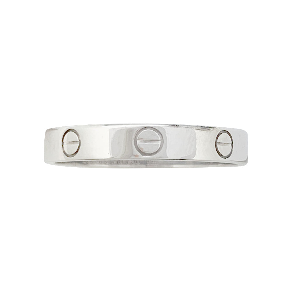 Bague Cartier, "Alliance Love", or blanc.