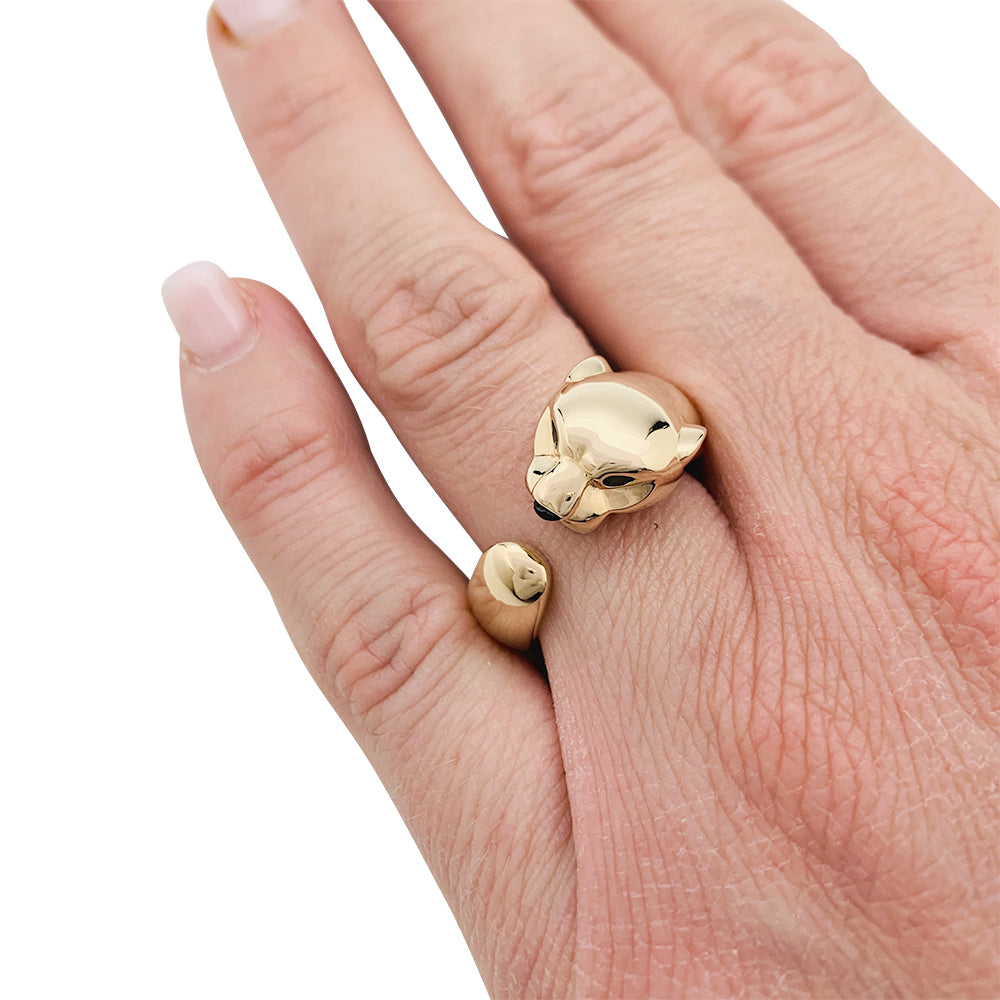 Bague Cartier "Panthère" en or jaune, grenats et onyx.