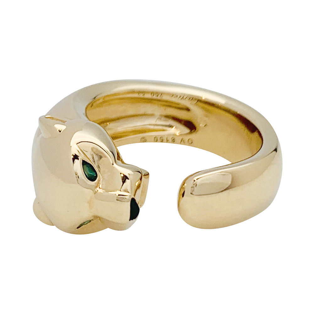 Bague Cartier "Panthère" en or jaune, grenats et onyx.