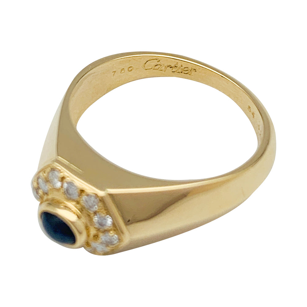 Bague Cartier or jaune diamants et saphir.