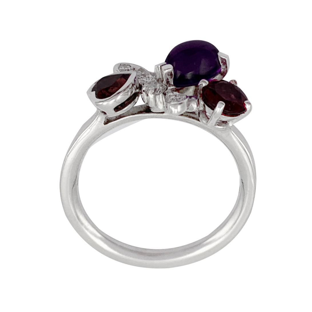 Chaumet ring, "Catch me...if you love me", white gold, amethyst, garnet, diamonds.