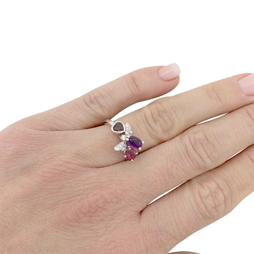 Chaumet ring, "Catch me...if you love me", white gold, amethyst, garnet, diamonds.