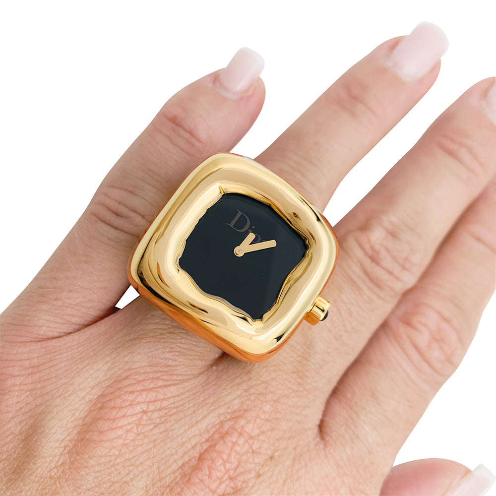 Dior watch ring, "Nougat" model, in yellow gold and onyx.