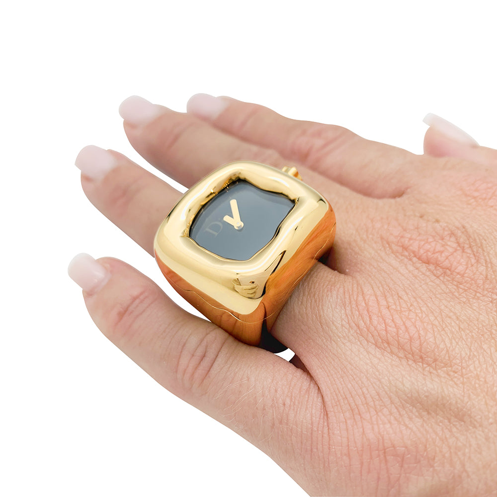 Dior watch ring, "Nougat" model, in yellow gold and onyx.