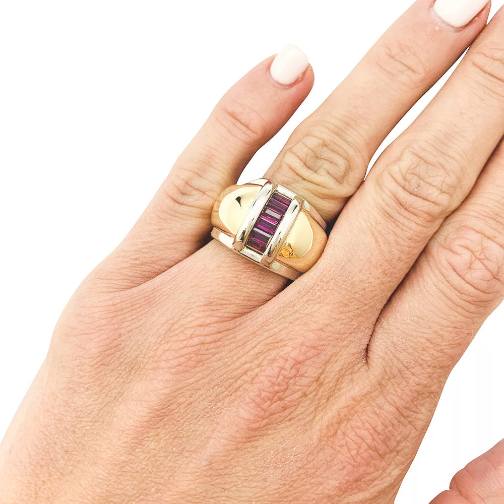 Poiray ring in yellow and white gold.