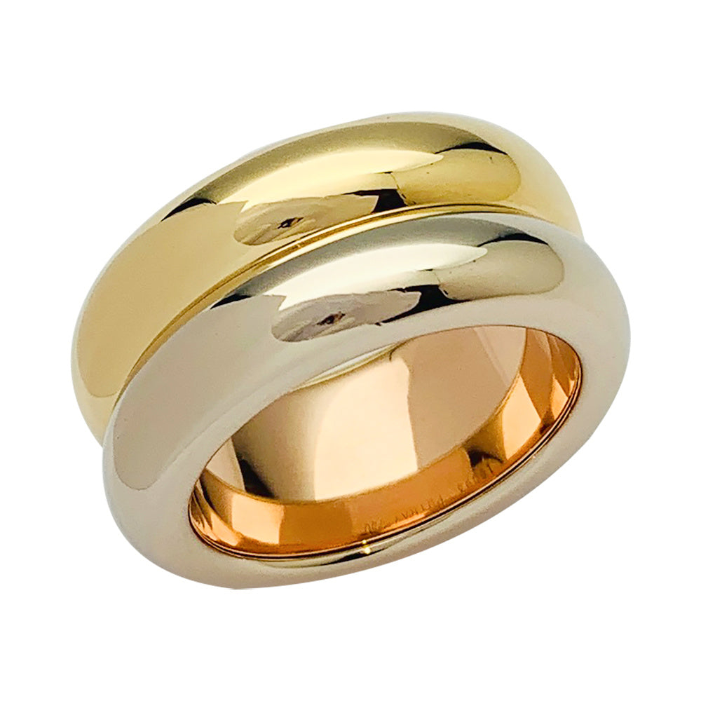 Poiray ring, "Symbol", three golds.