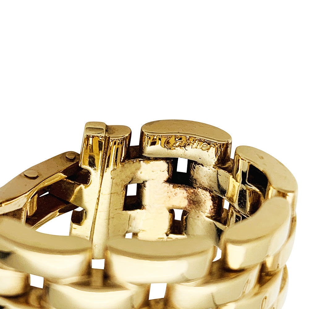 Cartier Panther link earrings in yellow gold.