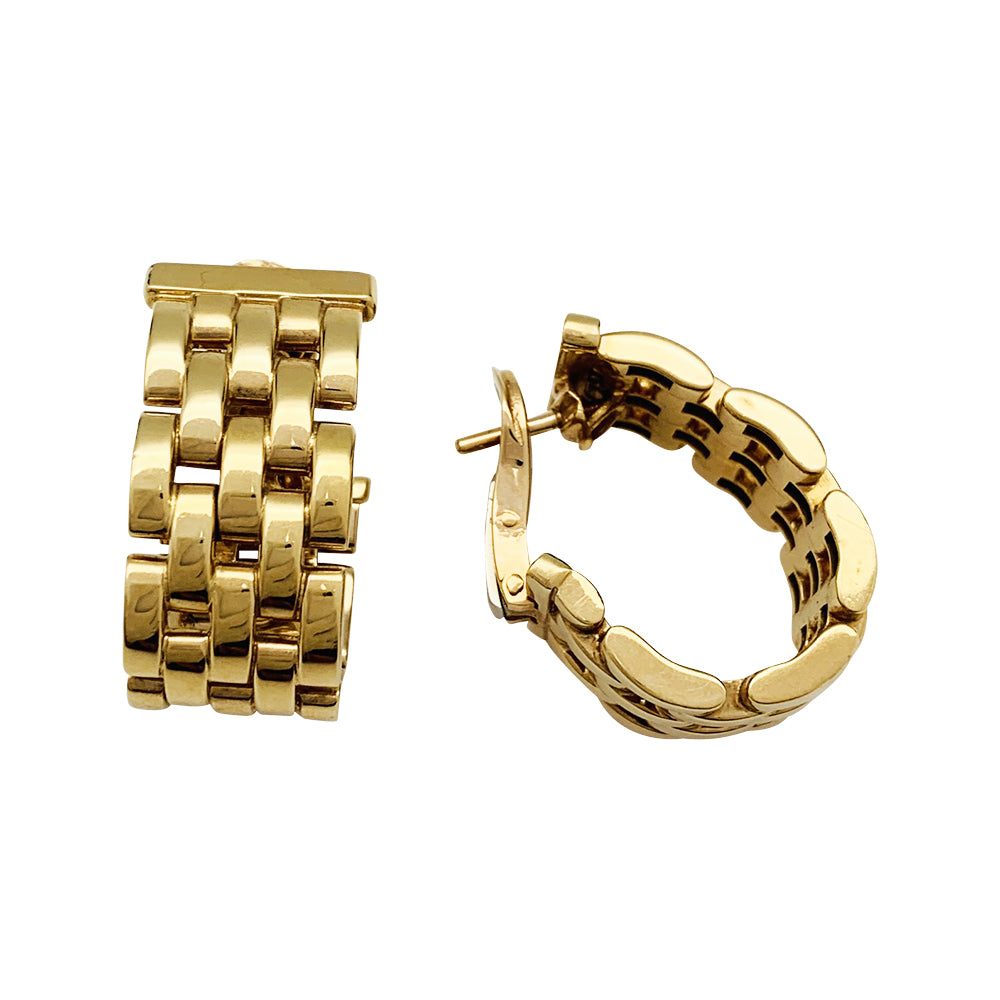 Cartier Panther link earrings in yellow gold.