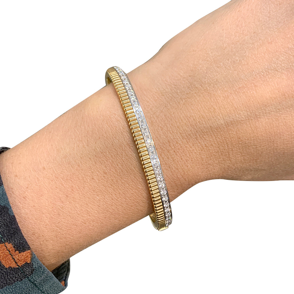 Boucheron bracelet, "Quatre Radiant", in yellow and white gold and diamonds.