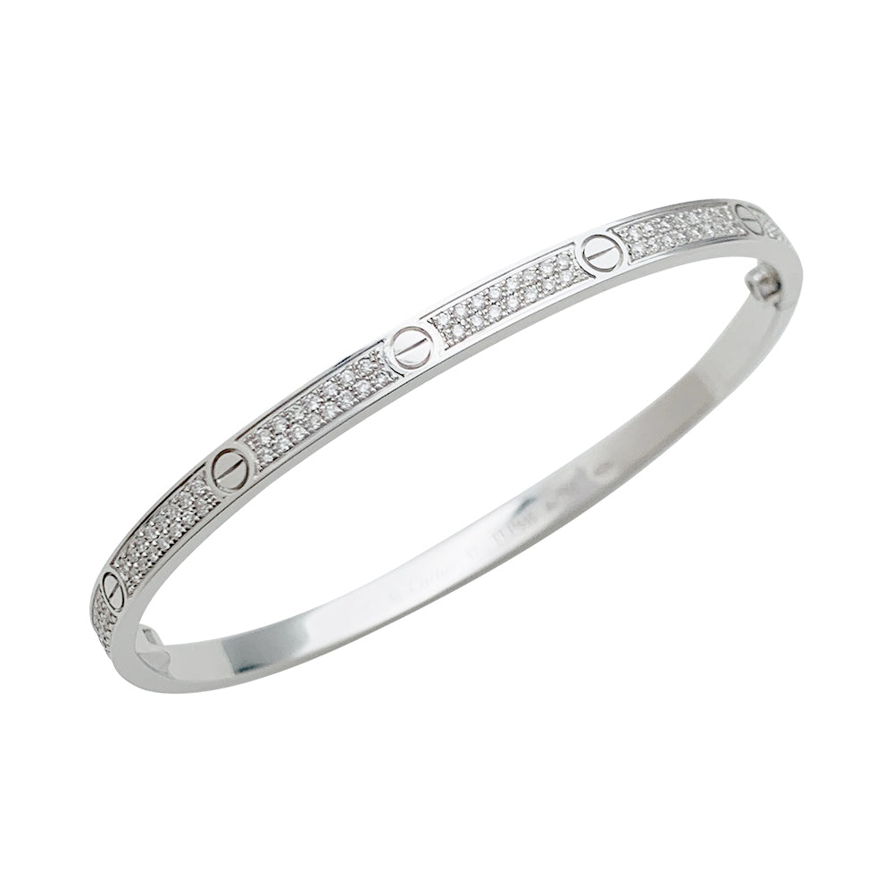 Cartier "Love" bracelet, white gold and diamonds.