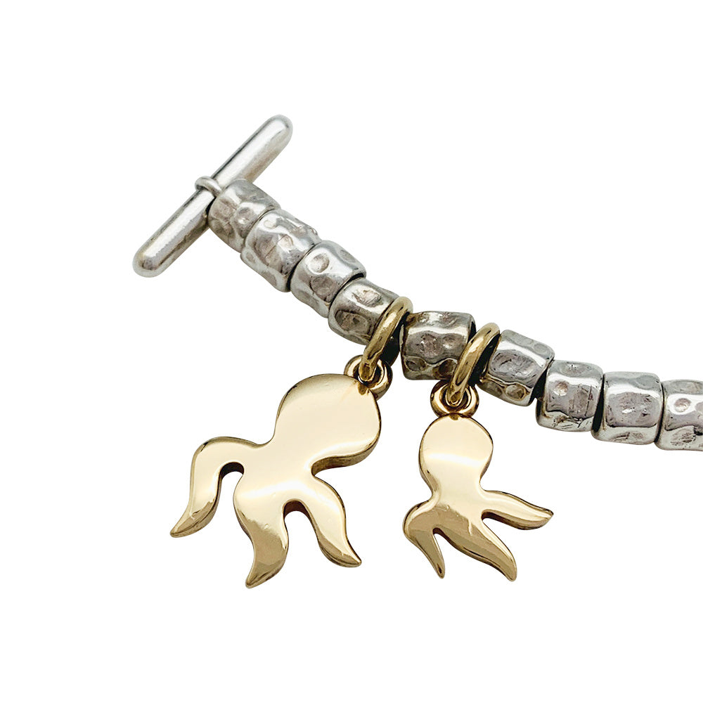 Dodo charm bracelet, silver and gold.