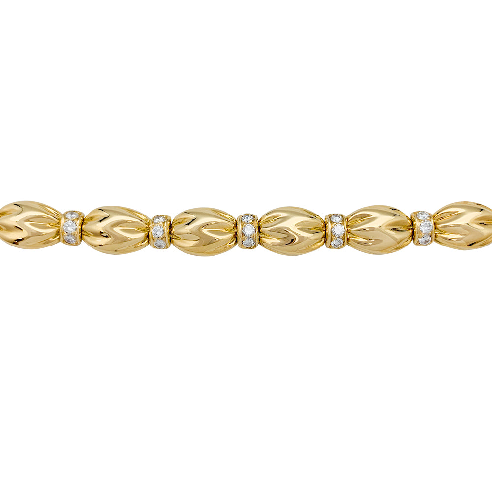 Van Cleef &amp; Arpels bracelet, "Drapé", yellow gold, diamonds.
