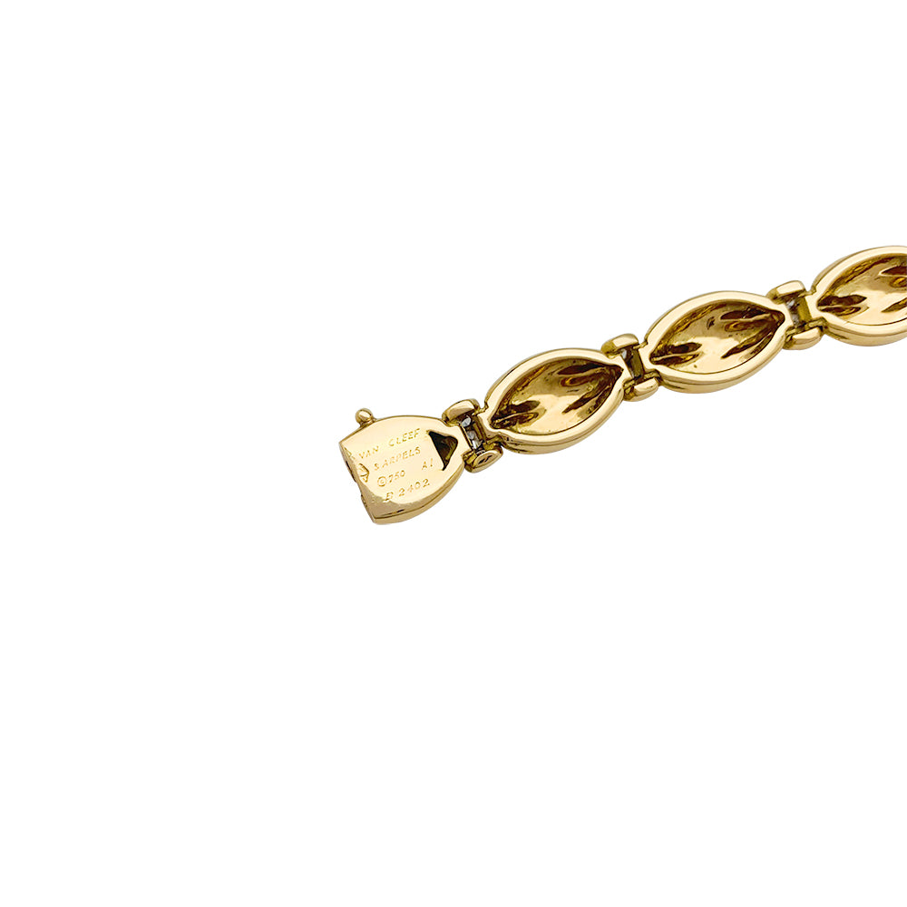 Van Cleef &amp; Arpels bracelet, "Drapé", yellow gold, diamonds.