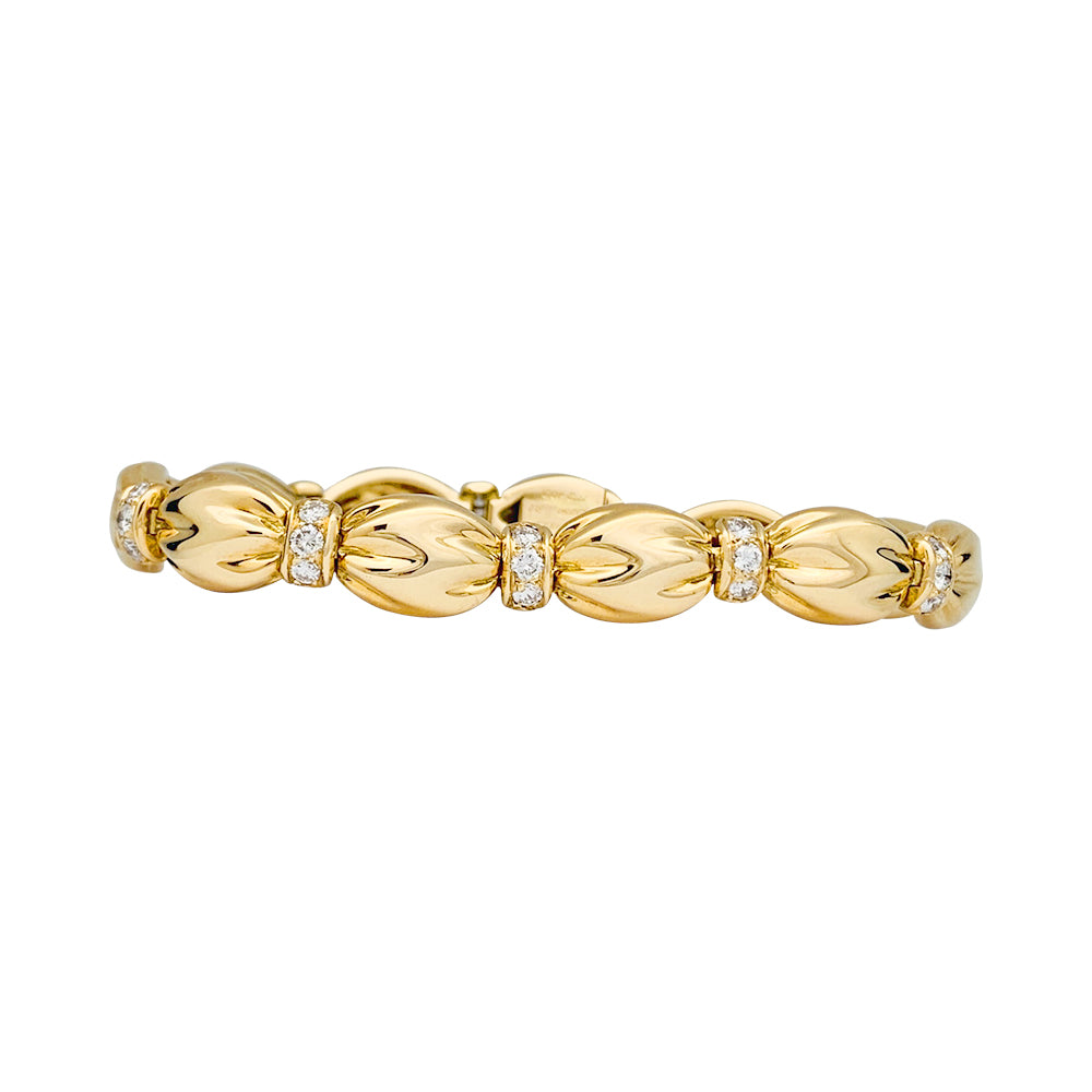 Van Cleef &amp; Arpels bracelet, "Drapé", yellow gold, diamonds.