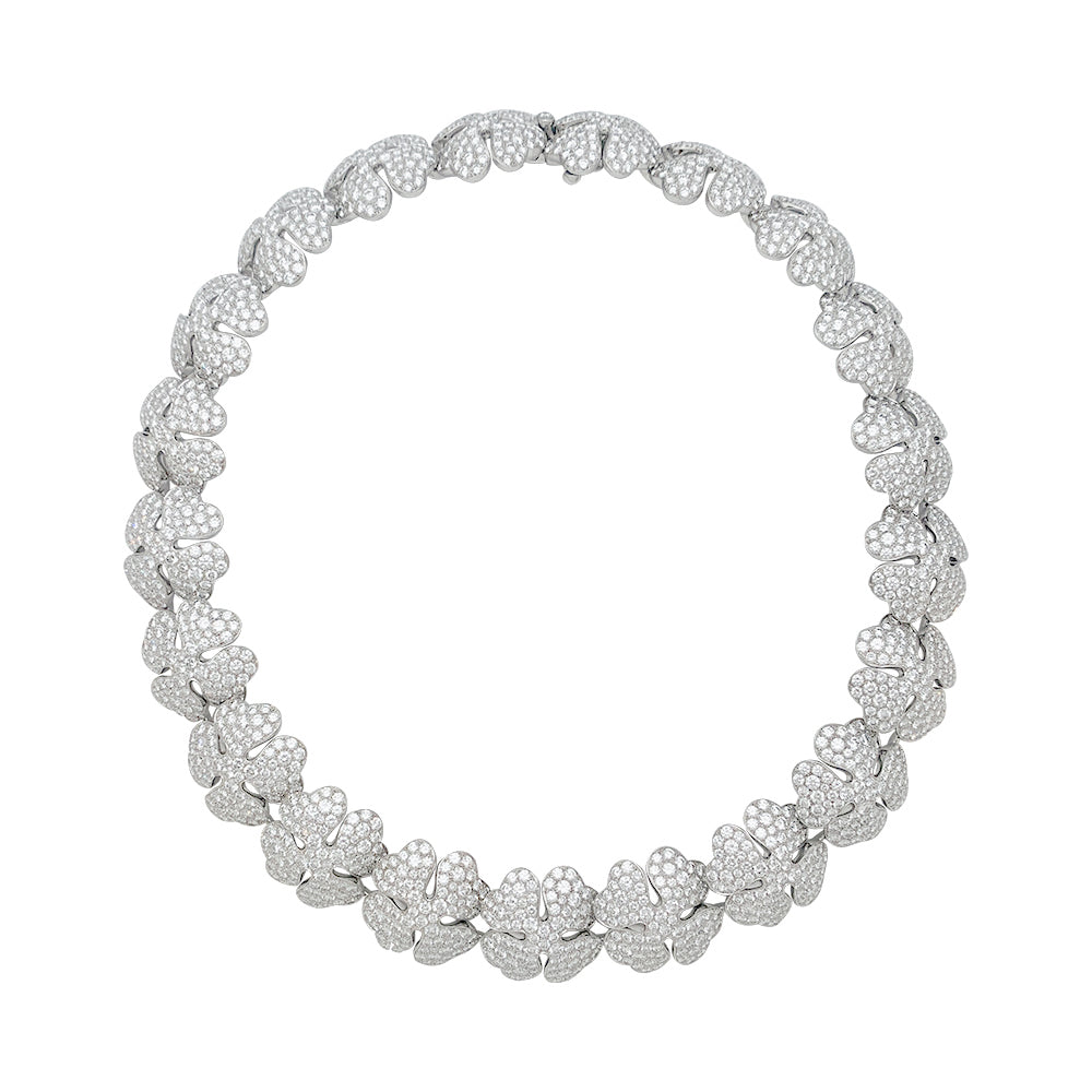 Cartier "Clover" necklace in white gold and diamonds.