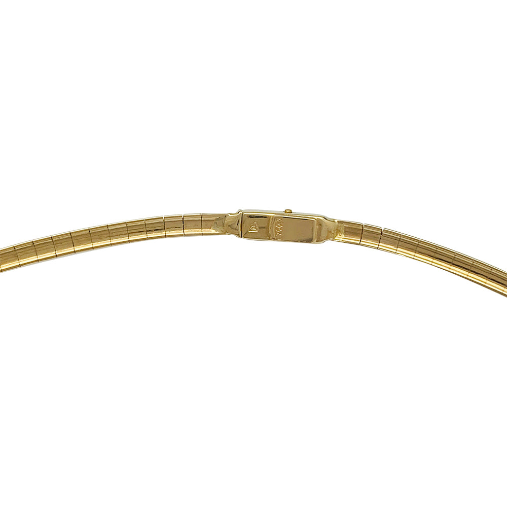 Stern omega necklace in yellow gold and diamonds.