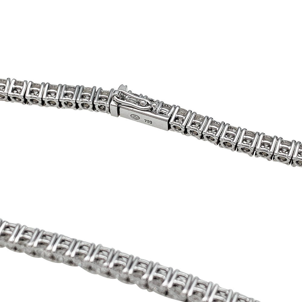 Gubelin white gold diamond tennis line.