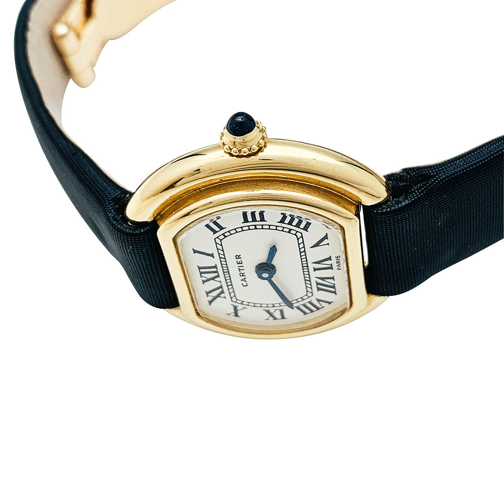 Cartier "Ellipse" watch in yellow gold.