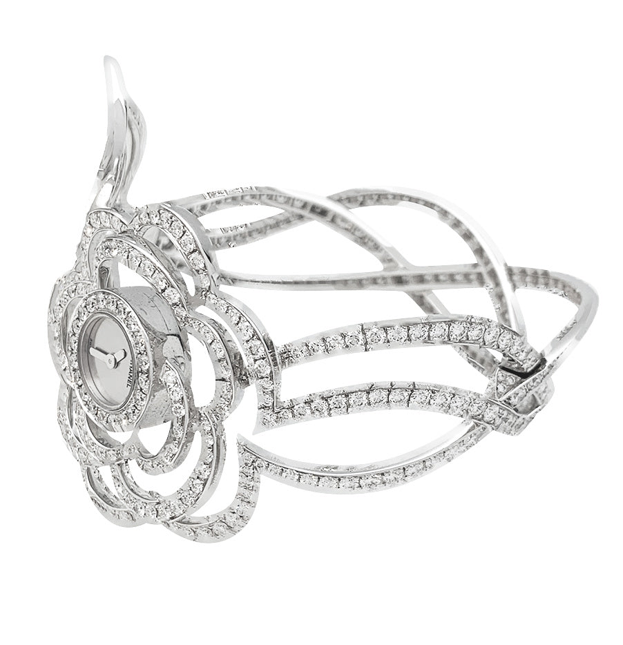 Exceptional Chanel "Fil de Camélia" watch in white gold and diamonds.