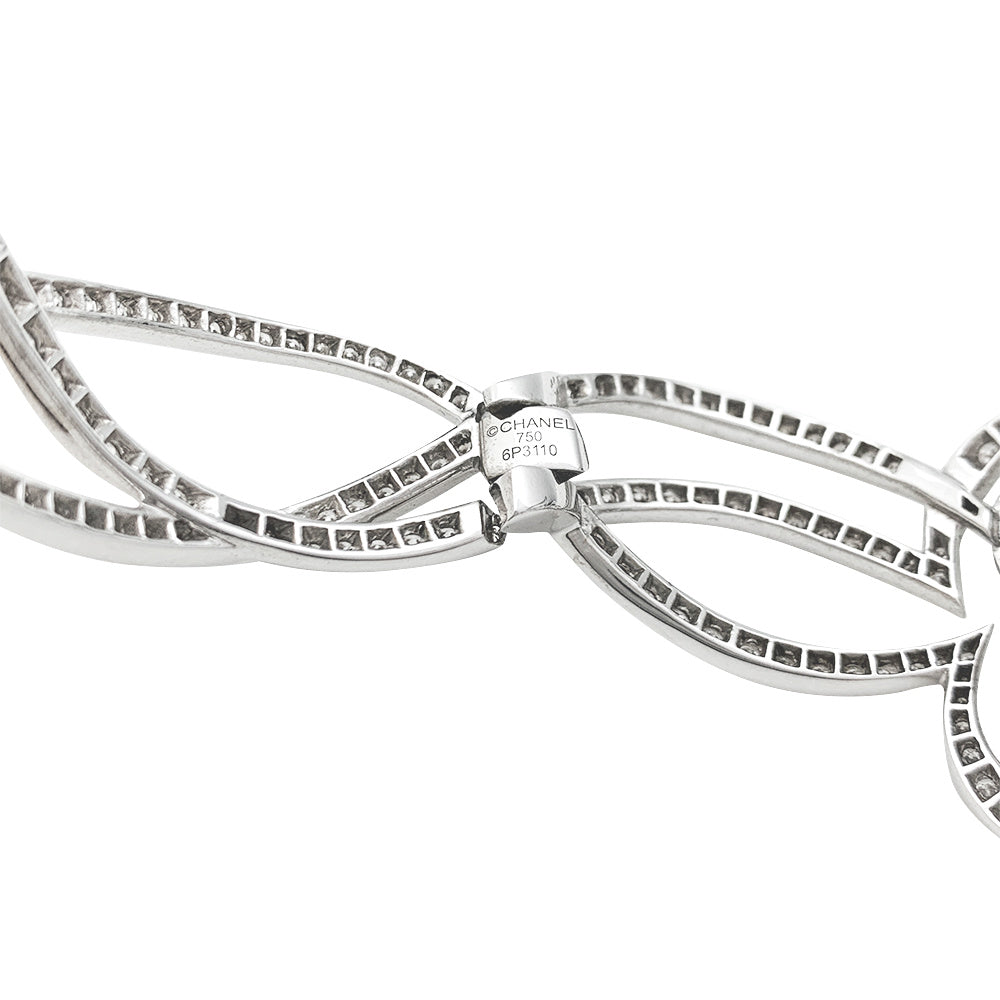 Exceptional Chanel "Fil de Camélia" watch in white gold and diamonds.