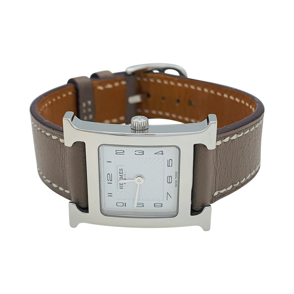 Hermès "Heure H" watch in steel and leather.
