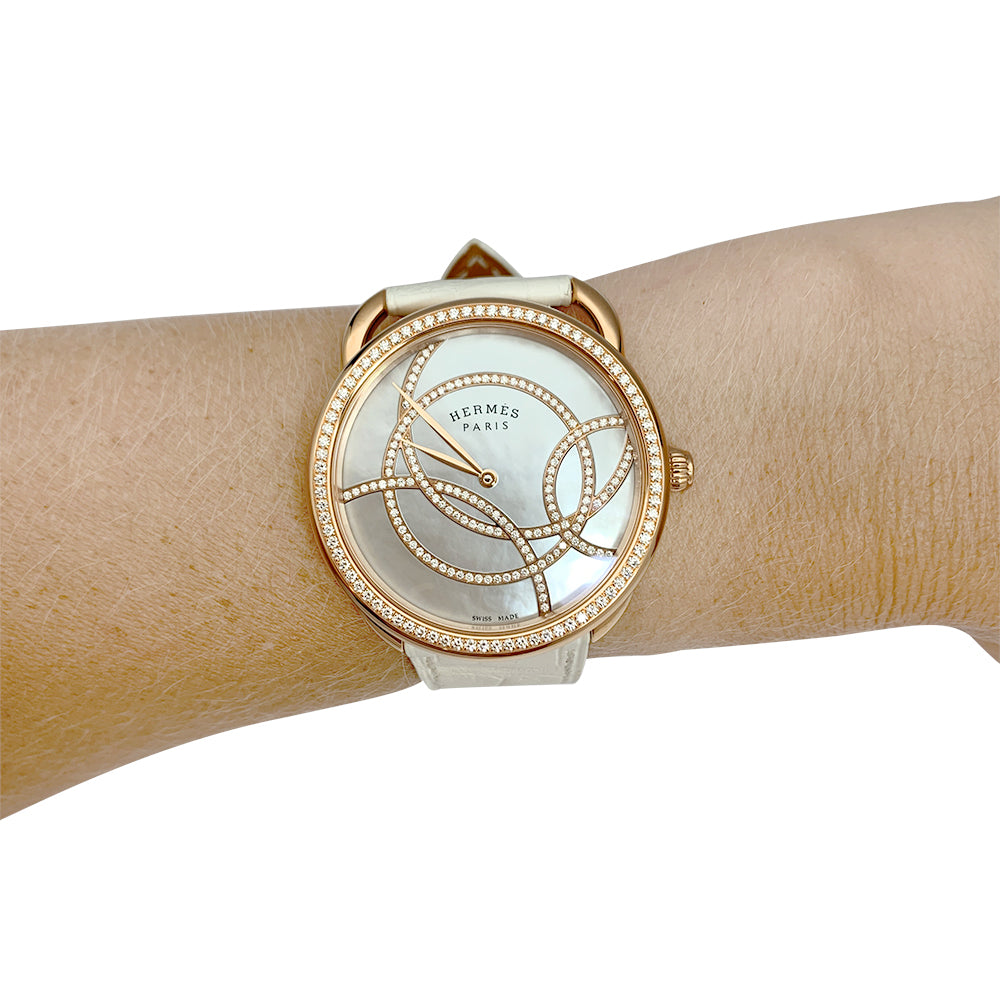 Hermès "Arceau" watch, rose gold, diamonds and leather.