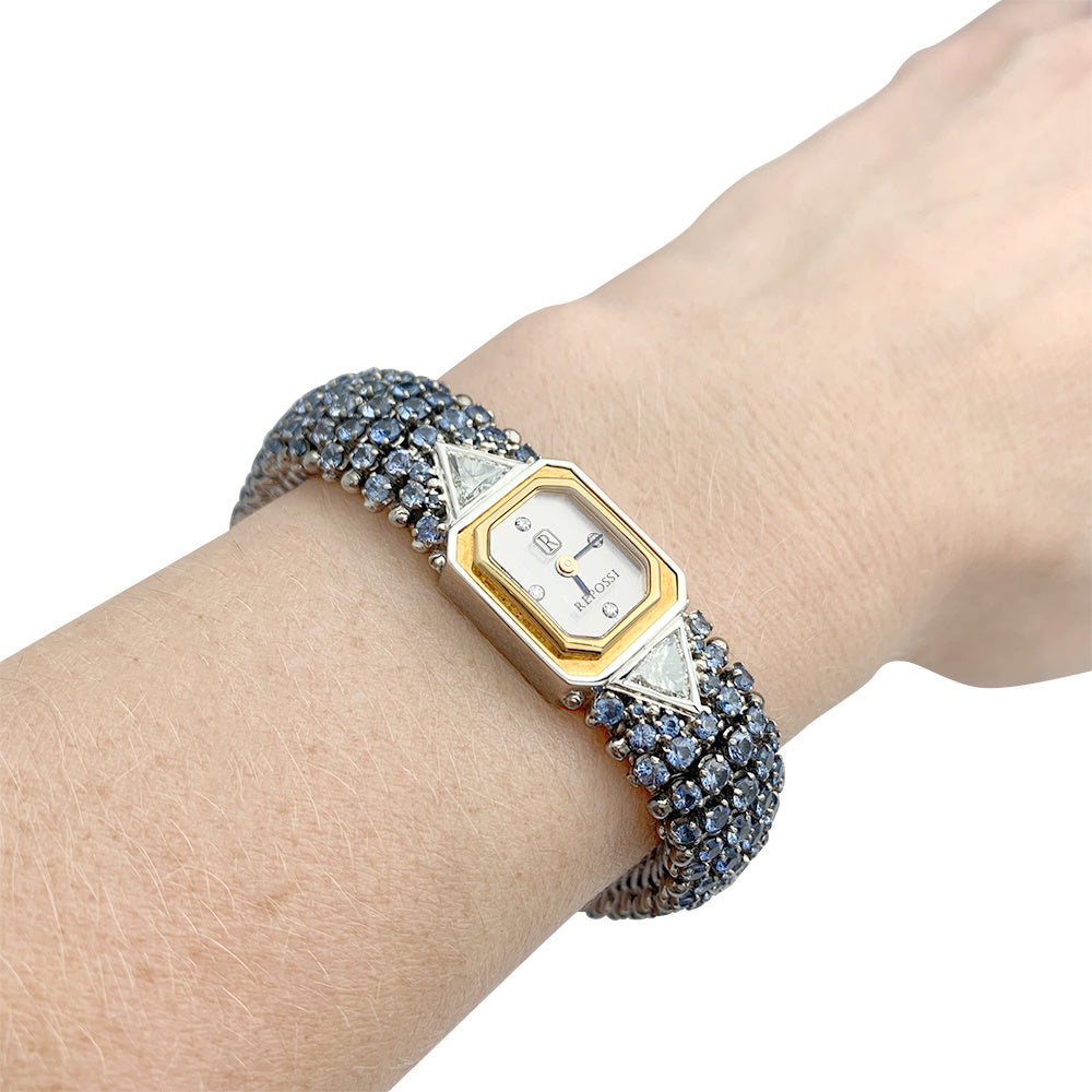 Montre Repossi, deux ors, saphirs, diamants.
