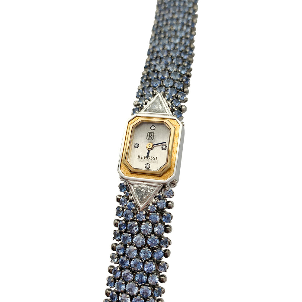 Montre Repossi, deux ors, saphirs, diamants.