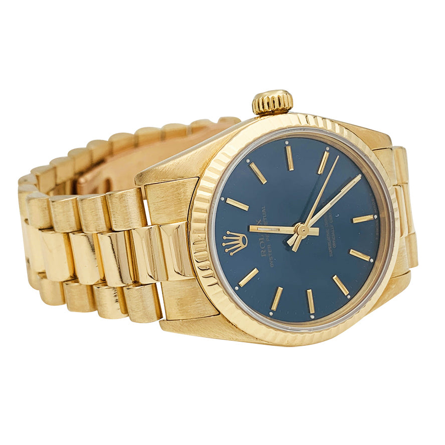 Rolex watch, “Oyster Perpetual” yellow gold.