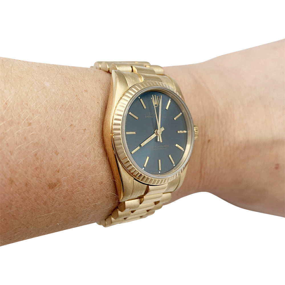 Rolex watch, “Oyster Perpetual” yellow gold.