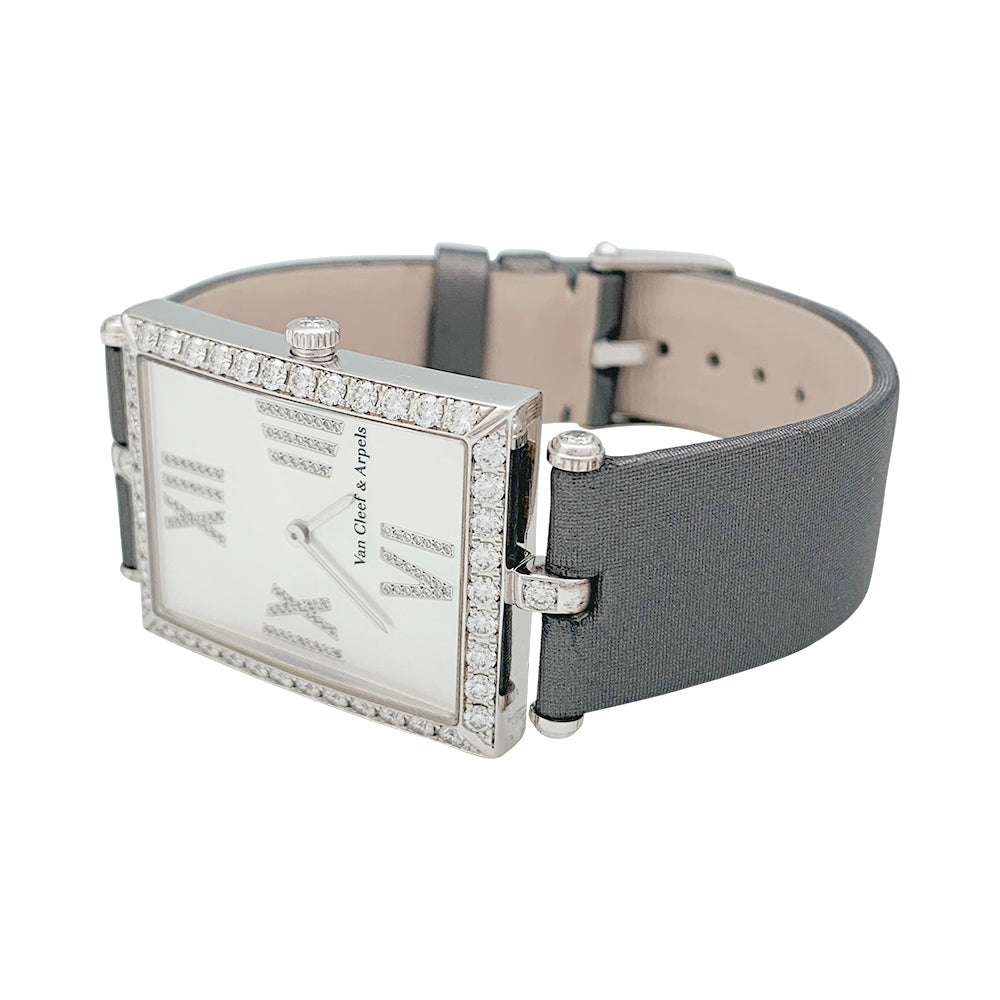 Van Cleef &amp; Arpels watch, "Classique Arpels" in white gold, diamonds, mother-of-pearl and satin.