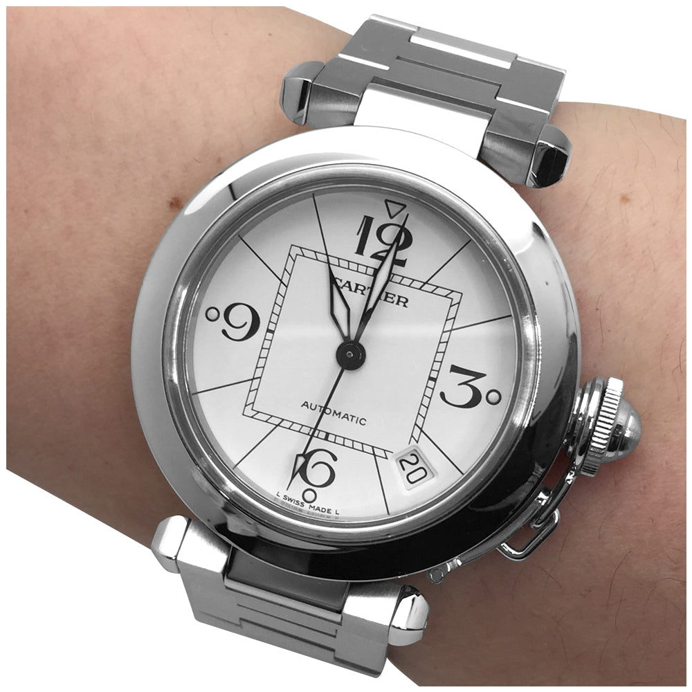 Cartier "Pasha" watch in steel on steel.