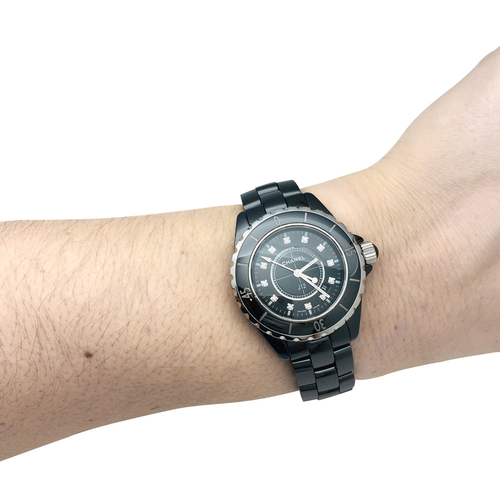 Chanel J12 black ceramic watch with diamonds.