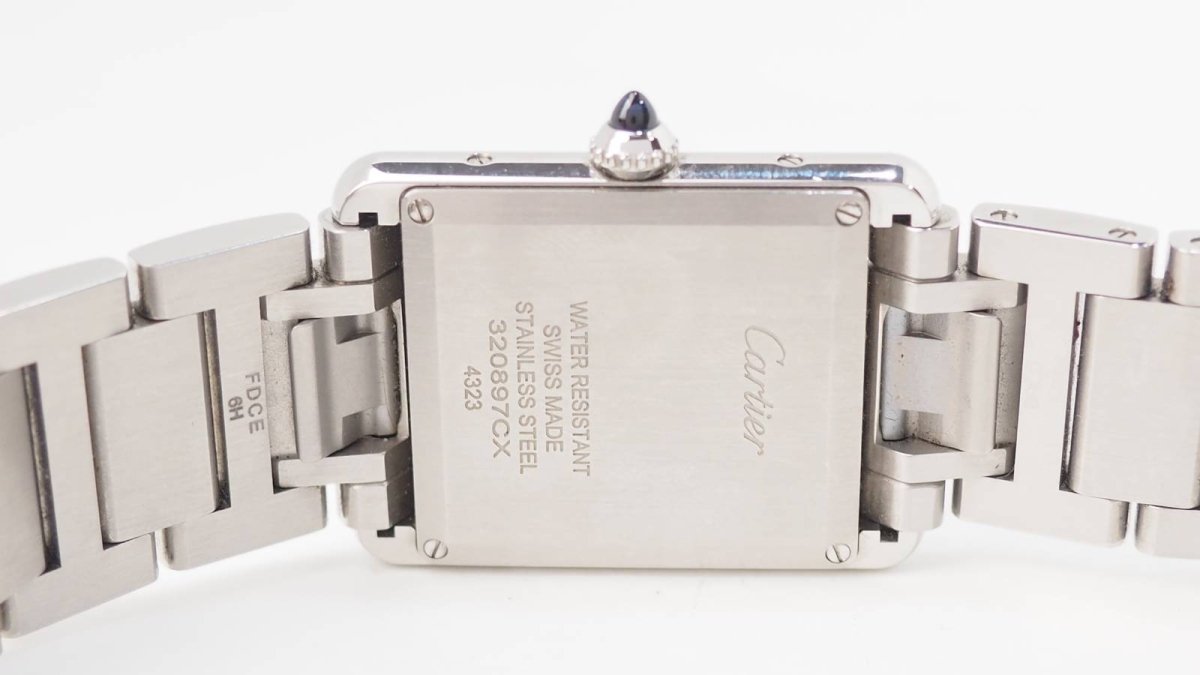 Cartier, Montre Tank 4323 Acier sur Acier - Maison Eloe