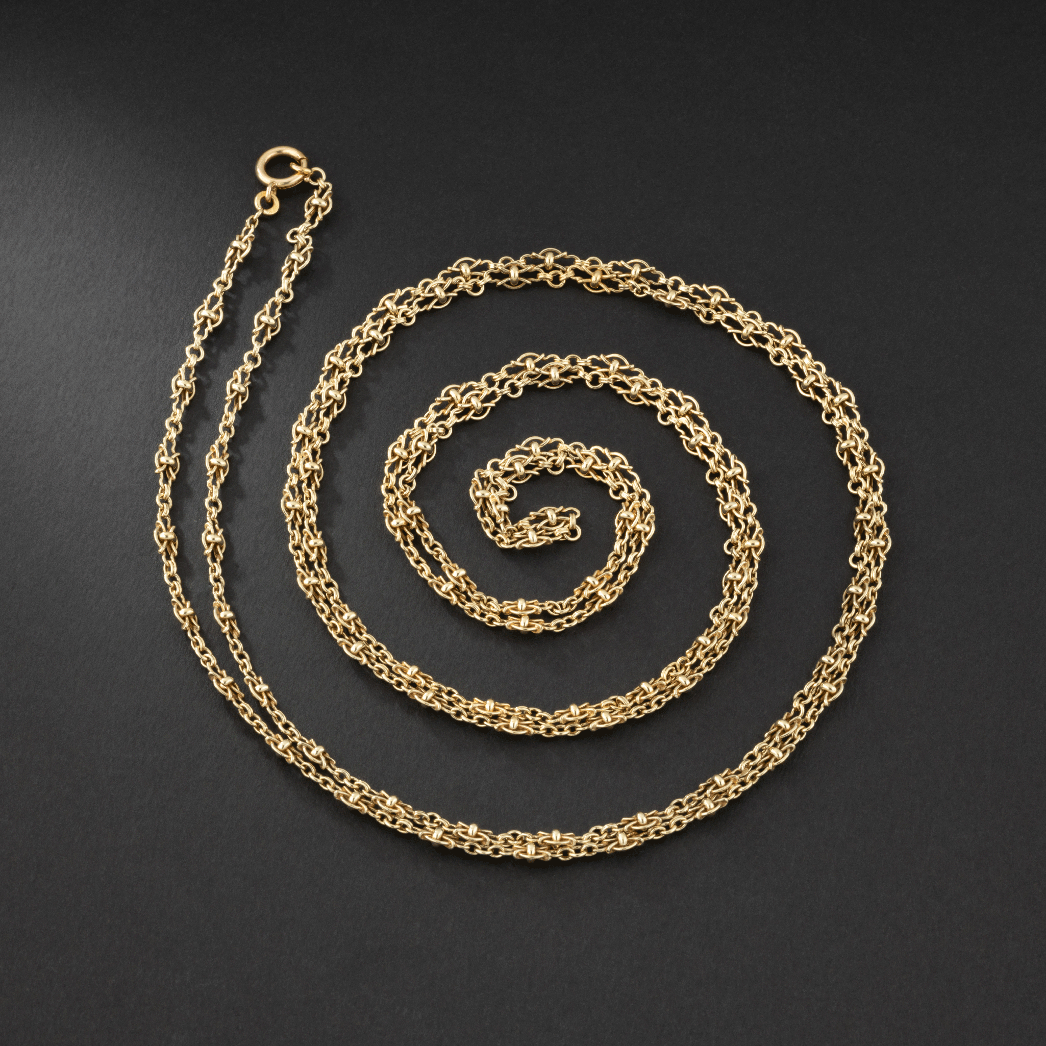 Sautoir ancien en or jaune. Travail Russe